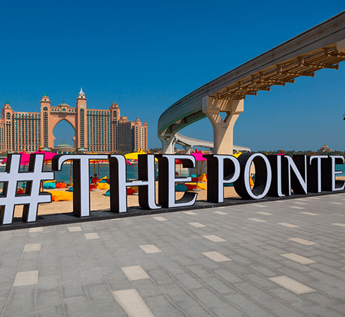 The Pointe's hashtag marquee with Atlantis Hotel appearing in the background of the photo